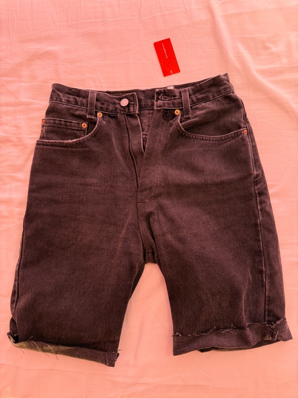 Vintage Levi’s 501 faded black cut off denim jean shorts jorts size 26 WOMENS